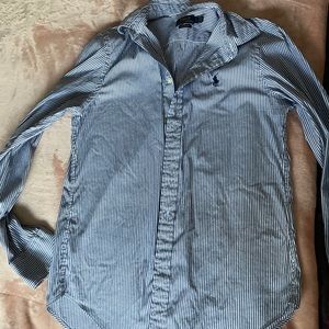 Women’s polo button up shirt